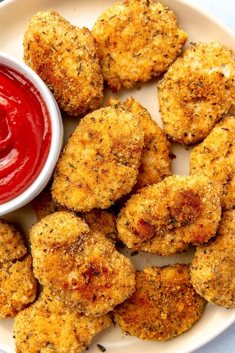 These picky-kid-approved, healthy Chicken Nuggets are crispy on the outside and juicy on the inside. They’re better than ones from a fast-food restaurant and even have hidden veggies inside! #groundchicken #chickennuggets #chicken #kidfriendly #airfryer #healthyrecipes Ground Chicken Nuggets, Chicken Nugget Dipping Sauce, Healthy Chicken Nuggets, Frozen Chicken Nuggets, Baked Chicken Nuggets, Chicken Nugget Recipes, Nuggets Recipe, Chicken Tender Recipes, Skinny Taste Recipes