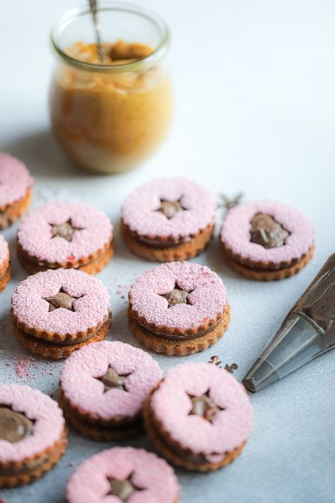 Sweet Treat 2: Raspberry Hazelnut Linzer Cookie with a Cocoa Hazelnut Praline Buttercream | JAM LAB Praline Buttercream, Linzer Cookie, Linzer Cookies Recipe, Linzer Cookies, Hazelnut Praline, Freeze Dried Raspberries, Dried Raspberries, Pretty Cookies, Chocolate Cinnamon