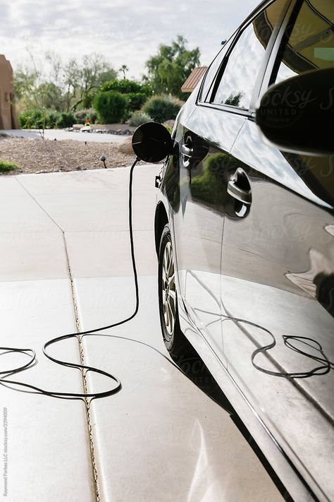 "Electric Car Charging Cable" by Stocksy Contributor "Raymond Forbes LLC" - Stocksy Electric Car Charging, Ev Charging, Electric Car, Electric Cars, Charging Cable, Cable, Electricity