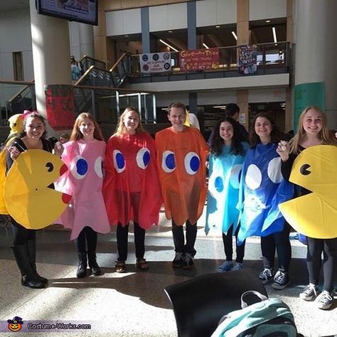 Abbie: From left to right: Gabrielle, Haley, Holly, AJ, Abbie, Bari, and Jenna. Homemade costumes out of tablecloths and paint for the ghosts. The Pacman are made out of cardboard, paint,... Pacman And Ghost Costume, Pacman Group Costume, 5 Person Group Costume, 5 Person Costume, 5 Person Costume Ideas, 5 Person Halloween Costume, Pacman Costume, Costumes For Groups, Halloween Carnival Games