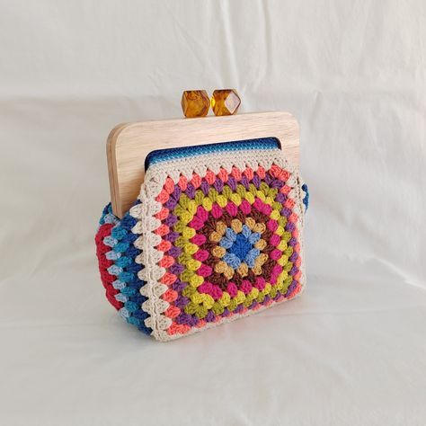 Excited to share the latest addition to my #etsy shop: Crochet Vintage Clutch with Wooden Clasp, Crochet Granny Square Purse Kiss Lock, Boho Festival Bag https://etsy.me/3r0iFC3 #birthday #bohohippie #crochetbohobag #crochetpurse #crochetpouch #vintagepurse #festivalpu Granny Square Purse, Festival Purse, Hippie Women, Pouch Crochet, Crochet Wallet, Crochet Boho Bag, Square Purse, Colorful Crochet, Crochet Handbag