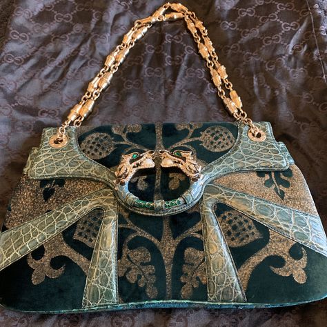 Excellent used condition Tom Ford for Gucci limited edition Dragon Bag .  I am the original owner of this bag  - bought in 2004.  .  It has been packed away for a few years.  All of my bags are very well looked after this is in excellent condition.  It will come with the original dust bag.  Body is made of velvet and alligator leather,  Interior is made of turquoise / absinthe colour suede - matching the outside.  There is one pocket inside, all Swarovski crystals on the Dragon are intact .  Hea Luxury Embellished Vintage Shoulder Bag, Luxury Green Embroidered Bag, Gucci Limited Edition Bag, Designer Alligator Leather Shoulder Bag, Luxury, Luxury Vintage Tapestry Shoulder Bag, Tom Ford Gucci, Alligator Purse, Gucci Purse, Velvet Purse