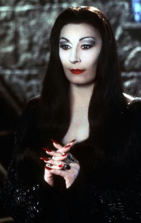 Anjelica Huston. Here as Morticia Addams on The Addams Family. Costume designed by Ruth Myers. Morticia Addams Quotes, Morticia And Gomez Addams, Charles Addams, Gomez And Morticia, Gomez Addams, Yvonne De Carlo, Anjelica Huston, Morticia Addams, Adams Family