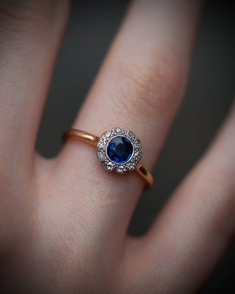 Here is a beautiful & simple Edwardian cluster ring 💍 With a vibrant sapphire surrounded by bright diamonds 💎 all set in 18k gold ✨ This ring would look beautiful stacked with others! This is available! DM for more info ✉️ —————————— #antique #antiquejewelryaddiction #jewellery #jewelry #antiquejewelry #antiquejewellery #sapphire #sapphirering #sapphirejewelry #diamond #diamondring #diamondjewelry #diamondjewellery #gold #goldring #ring #edwardian #edwardianjewelry #edwardianjewellery Edwardian Jewelry, Cluster Rings, Look Beautiful, Sapphire Jewelry, Antique Jewellery, Cluster Ring, Sapphire Ring, Antique Jewelry, Diamond Jewelry