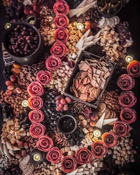 This romantically lit, gothic styled, dark & delicious grazing table is our final offering for spooky season 💀 ‘Til next year, boys & ghouls! NOW WHO’S READY FOR THANKSGIVING, CHRISTMAS & NEW YEAR CHARCUTERIE?!? 🦃🎄✨ You can shop our holiday specials! https://alaskaberryandboard.com/specials #charcuterie #charcuterieboard #charcuterieboards #graze #grazingtables #grazingtable #holidaycharcuterie #holiday #halloween #thanksgiving #christmas #newyear #alaska #shoplocal New Year Charcuterie, Crow Party, Char Board, 2025 Inspiration, Gothic Garden, Grazing Table, Holiday Halloween, Grazing Tables, Gold Christmas