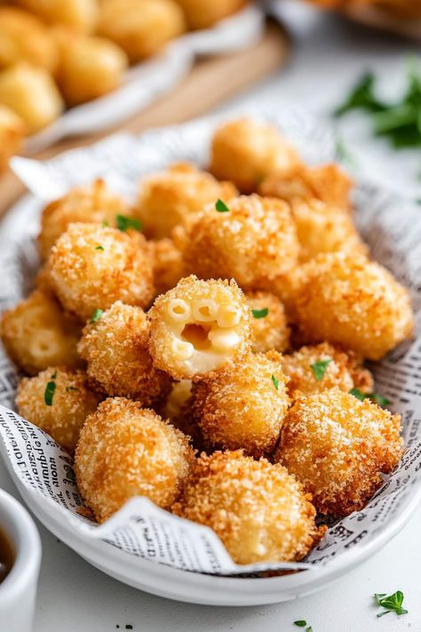 Crispy on the outside and ooey-gooey on the inside, these mac and cheese bites are the ultimate comforting snack or crowd-pleasing party appetizer. Mac And Cheese Fingerfood, Fried Mac And Cheese Bites, Fried Mac N Cheese Balls, Mac N Cheese Bites, Cheese Bites Recipe, Fried Mac And Cheese, Mac And Cheese Bites, Making Mac And Cheese, Breaking Bread