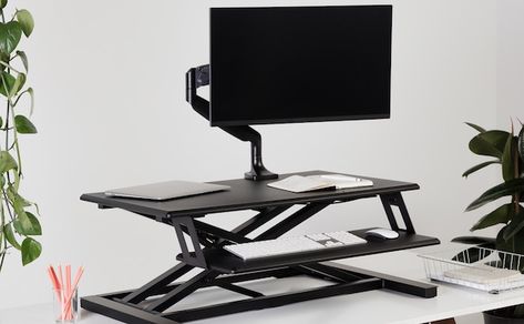 The Cooper Standing Desk Converter is a sit to stand surface that converts your existing table into an adjustable workstation. Transform your work space! Standing Desk Riser, Home Office Set Up, Desk Riser, Standing Desk Converter, Monitor Arm, Outdoor Storage Cabinet, Folding Desk, Desk Inspiration, Computer Stand