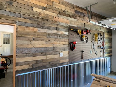 Pallet wood, peg board, and corrigated steel Garage Wood Shop, Wood Peg Board, Garage Ideas, Shop Wall, Pallet Wood, Peg Board, Pallet Diy, Wood Shop, Wood Pallets