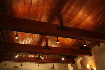 Wood Beam Track Lighting Design Ideas, Pictures, Remodel and Decor Living Room Track Lighting Ideas, Ceiling Beams With Lights, Track Lighting Living Room, Sloped Ceiling Lighting, Easy Home Updates Diy, Rustic Track Lighting, Exposed Wood Ceilings, Post And Beam Home, Rustic Ceiling