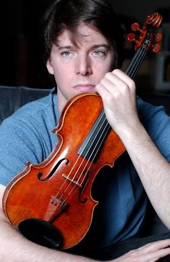 AP 2003 / Joshua Bell holds the Gibson ex Huberman, a Stradivarius violin made in 1713.  this is THE violin of the movie, The Red Violin.  the movie is based on this violin's story. The Red Violin, Red Violin, Joshua Bell, Stradivarius Violin, Antonio Stradivari, Classical Musicians, Film Score, The Violin, Violinist