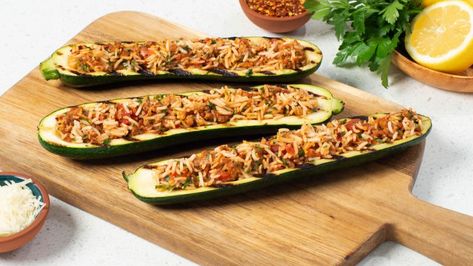 Zucchini Boats Stuffed with Rice and Sausage | Success® Rice Zucchini Boats Sausage, Success Rice Recipes, Grilled Zucchini Boats, Chicken Masala Recipe, Sausage And Rice, Zucchini Rice, Stuffed Zucchini Boats, Sausage Ingredients, Sausage Stuffed Zucchini