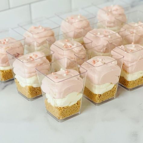 Homemade by Amina on Instagram: "Strawberry cheesecake ombré dessert shooters. I’ll be posting all the other desserts for the bridal shower dessert table over the next few days. The theme was blush pink and white. • • #dessertshooters #dessertshots #strawberrycheesecakeshooters #bridalshower #bridalshowerdesserts #bridalshowerdesserttable #desserttable" Light Pink Dessert Table, Blush Dessert Table, Pink Parfait Desserts, Pink Cheesecake Cups, Pink Dessert Shooters, Baby Shower Girl Dessert Table, Baby Girl Dessert Table, Pink And White Desserts, Coquette Dessert Table