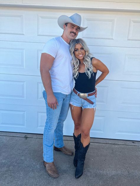 Street Dance Outfit Country, Black Romper Country Outfit, Couples Country Outfits, Summer Rodeo Outfits Shorts, Summer 2024 Concert Outfit, Jean Shorts With Cowboy Boots, Nashville Couple Outfits, Simple Country Concert Outfit Summer, Tenesse Outfit Summer