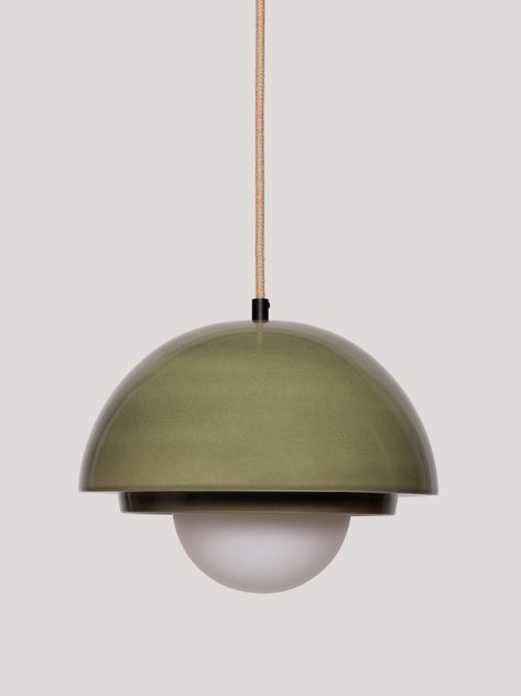 Handmade, and fully customisable ceramic pendant light The Gura ceramic hanging light has a rounded and geometric form and a XXL porcelain bulb, which highlights a visual that is unlike any other model. It comes in two sizes and adds a unique touch to any environment. This stunning ceramic light is fully customisable in order to adapt to every space. Please let us know which glaze colour, textile electric cable colour and cord grip finishing you desire. Where it comes from Sustainably designed a Interior Palette, Green Pendant Light, Family Room Lighting, Ceramic Pendant Light, Small Pendant Lights, Green Pendants, Ceramic Light, Ceramic Pendant, Green Ceramics