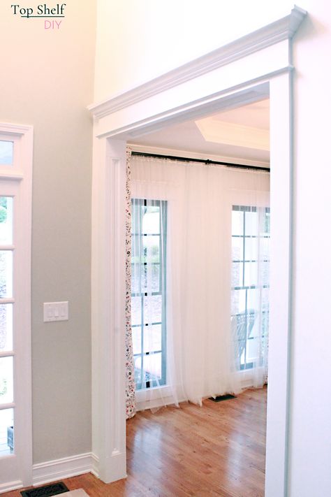 Find out how to beef up your existing doorway trim to create the illusion of wider doorway casing. Follow the step-by-step process here! #doorwaytrimdiy #Doorwaytrimideas #Doorwaytrimdoorcasing #Doorwaytrimdiy #Doorwaytrimfarmhouse #craftsmantrim Trim Around French Doors, Door Frame Trim Ideas, Doorway Upgrade, Farmhouse Doorway Trim, Doorway Framing Ideas, Colonial Interior Trim, Doorway Trim Door Casing, Trim Work Around Doors, Interior Doorway Trim