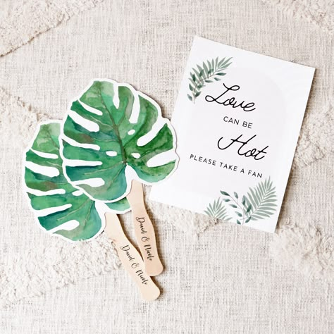 "Palm Leaf Hand Fans make a cute favor for guests at your destination beach themed wedding.  Use them to keep guests cool at your Hawaiian ceremony or as favors for your bachelorette weekend!  For a custom touch you can add CLEAR personalized labels to your order. ★DETAILS★ Listing is for 10 Palm Leaf Fans. Personalized CLEAR Labels can be added for an additional cost - make sure to send text info if you choose to add labels. Fans arrive separate from the clear labels. Some assembly required (attaching the self-stick labels to the paddle fans).  Size: 6.75\" X 7.5\" for the card; 12\" total (handle included). Material:  Laminated printed paper + Wooden Handle TROPICAL BEACH IDEAS https://www.etsy.com/shop/ModParty?ref=l2-shopheader-name&search_query=palm" Tropical Favors For Guests, Destination Wedding Fans, Hawaii Theme Wedding Ideas, Palm Fans Wedding, Tropical Wedding Favors, Tropical Wedding Aisle, Hawaiian Wedding Theme, Destination Wedding Favors For Guests, Tropical Party Favors