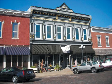 Through a happy coincidence, an historic pressed-metal Mesker façade from the Stewardson Opera House in Stewardson, IL, a building slated to be torn down, found a new home on this historic building in Arcola, IL. The re-installed Mesker façade is a near-perfect fit on the top half of the Arcola building and an ideal cap to the new period storefront below. All Mesker photos: courtesy of Illinois State Historic Preservation Agency Store Plan, Home Theater Installation, Renovation Architecture, Metal Facade, Town Building, Storefront Design, Small Town America, Building Renovation, Traditional Building