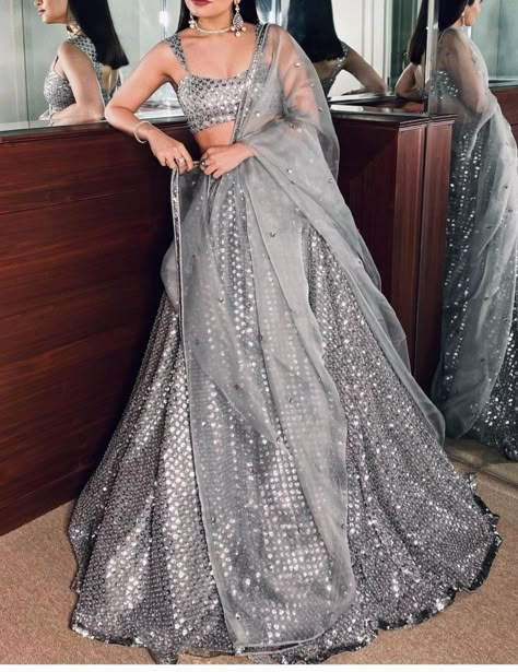 Discover the epitome of elegance and style with our collection of Pakistani Lehengas! From indie vibes to rocker chic, we have the perfect Lehenga for every occasion. Explore the latest designs featuring intricate embroidery and stunning details, ideal for weddings, mehndi ceremonies, or any special event. Embrace the simplicity and classiness of Pakistani Lehengas while making a statement on... Bridesmaid Dresses Lehenga, Desi Prom, Pink Mirror Work Lehenga, Party Wear Skirt Top, Mirror Work Lehenga Choli, Dresses Lehenga, Grey Lehenga, Pakistani Lehenga, Mirror Work Lehenga