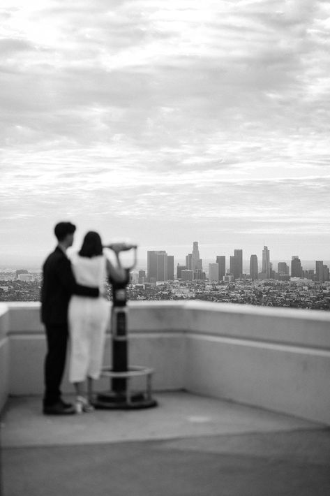 An engagement session in Los Angeles, particularly at iconic locations like Griffith Observatory and Downtown LA (DTLA), offers a unique blend of urban elegance and natural beauty, providing the perfect backdrop to celebrate your love story. Dtla Engagement Photos, Downtown La Engagement Photos, Griffith Observatory Photoshoot, Griffin Observatory Los Angeles, Griffith Observatory Elopement, Los Angeles Griffith Observatory, Downtown Los Angeles Engagement Photos, Griffith Observatory Engagement Photos, Engagement Photos Griffith Observatory