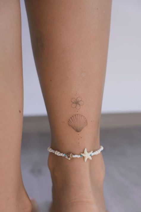 Shell Small Tattoo, Medium Ankle Tattoo, Tattoo Ideas Female Delicate, Stick And Poke Wrist Tattoo, Beachy Hand Tattoos, Small Traveling Tattoos, Hawaiian Words Tattoo, Frangapenni Tattoo, Tattoo Ideas Beach Theme