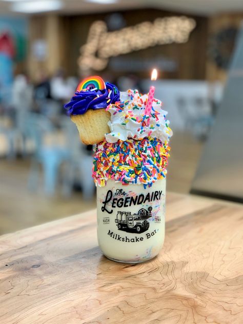 Nothing can hold a candle to this shake! Our Legendairy Birthday Shake starts with Blue Bell vanilla ice cream, vanilla icing rim rolled in rainbow sprinkles, whipped cream covered in extra sprinkles, complete with a vanilla celebration cupcake and a lit birthday candle on top! Loaded Milkshake, Fancy Shakes, Fancy Milkshakes, Birthday Cake Shake, Crazy Milkshakes, Monster Shakes, Milkshake Shop, Cake Shake, Brownies Cheesecake