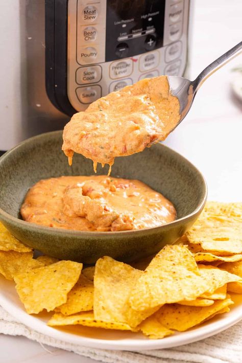 This quick and easy Instant Pot Queso blends creamy texture and bold flavors in just 5 minutes. Perfect for gatherings, it's a crowd-pleaser served with tortilla chips! Instant Pot Queso, Creamy Texture, Crowd Pleaser, Tortilla Chips, Gravy, Instant Pot, Jelly, Sauce, Chips