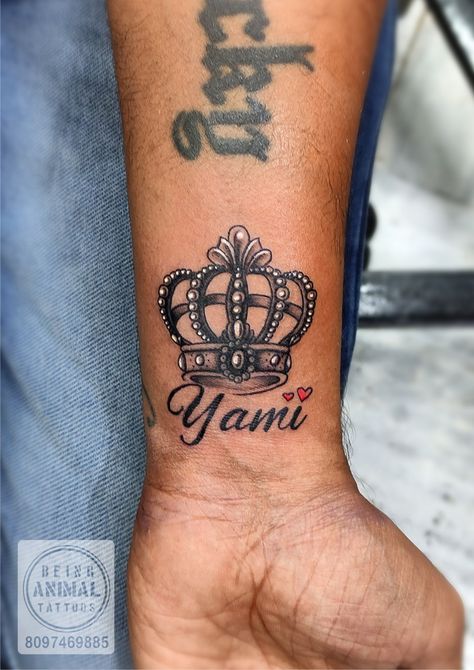 Crown tattoo with Yami name with heart at Being animal tattoos Jogeshwari Mumbai book your appointment at 8097469885 Crown Tattoo With Name, Name With Crown Tattoo, Crown Tattoo, Name Tattoo, Name Tattoos, Book Your Appointment, Animal Tattoos, Tattoo Artist, Jesus Fish Tattoo