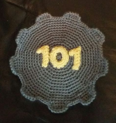 So I have decided to post the pattern I created for the Vault 101 door. Check it out under the cut! (The end is a little complicated & I will add the numbers soon!) Legend SC = Single Crochet ST =... Fallout Crochet, Gaming Crafts, Fallout Theme, Knitting Graphs, Yarn Toys, Crochet Stuffies, Crochet Tablecloth Pattern, Crochet Geek, Geek Crafts