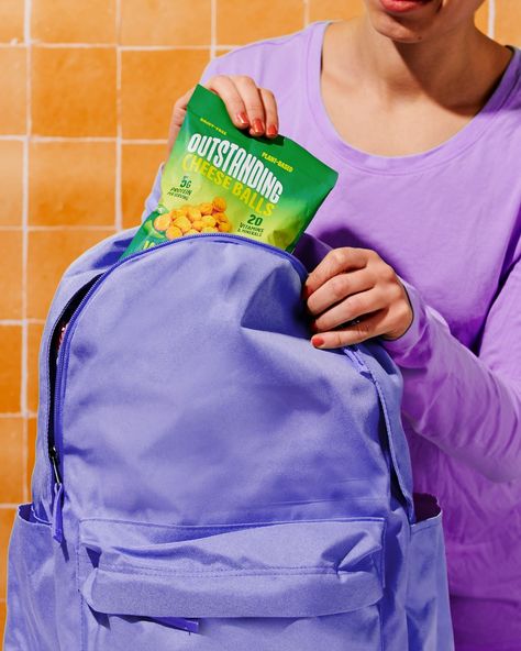 Say goodbye to lunchtime battles! Our Outstanding Cheese Balls are the ultimate solution – mom-approved, kid-beloved, and made with hidden veggies. Add them to your cart for stress-free snack packing today! 🎒🧀🥦 #snacks #lunchtime #lunchsnacks #schoolsnacks #snacksforkids Snacks Photoshoot, Chips Photoshoot, Snack Photoshoot, Snack Product Photography, Snack Advertising, Snack Lifestyle Photography, Anti Design, Photoshoot Model, Lifestyle Shoot