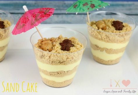 Sand Dirt Cake is a delicious dessert for a beach themed party or an after school snack for children. The layered dessert features layers of pudding and crushed Golden Oreo cookies. Each Sand Cake Dirt Cup is topped with an umbrella and Teddy Grahams for Dirt Cake Recipes, Sand Cake, Dirt Cake, Dessert Aux Fruits, Beach Themed Party, Köstliche Desserts, After School Snacks, Great Desserts, Kids Snacks