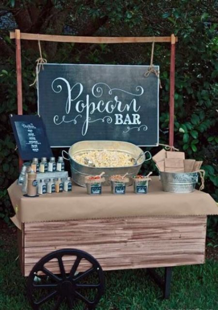 26 Wedding Reception Popcorn Station Ideas. A rustic market cart used as a popcorn bar table-top. Galvanized wash tubs make excellent popcorn containers. Katering Pernikahan, Wedding Food Stations, Rustic Wedding Decorations, Popcorn Bar, Food Stations, Chalkboard Sign, Pizza Party, Wedding Cake Designs, Outdoor Bar