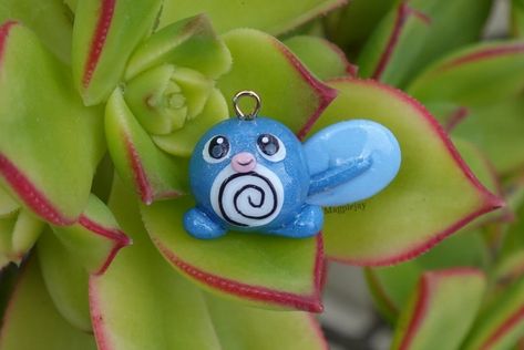 Poliwag 💙🩵 - - - ✨ - ✨ - ✨ - ✨ - #polymerclay #axolotl #etsy #smallbusiness #clayart #clay #sculpture #gamingart #girlartist #kawaii #chibi #keychain #pokemon #bugs #rdr2 Chibi Keychain, Pokemon Keychain, Clay Pokemon, Clay Models, Girl Artist, Rdr 2, Kawaii Chibi, Clay Sculpture, Clay Art