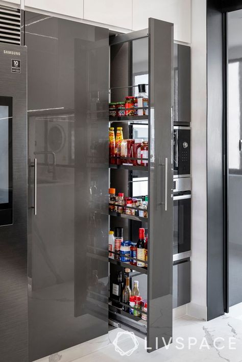 Small Kitchen With Tall Unit, Tall Pull Out Kitchen Cabinets, Kitchen Bottle Pull Out, Masala Pullout Kitchen, Kitchen Tool Unit, Kitchen Tall Cabinet Ideas Modern, Bottle Pull Out, Modular Kitchen Trolley Design, Modular Kitchen Cabinets Drawers