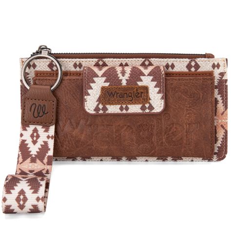 Made of PU leather and canvas trimmed, this bi-fold wallet has: Aztec pattern trim Wrangler logo applique Button closure Wrangler logo embossed A zipper compartment Inside wallet has 12 credit card slots, 1 ID slot ,and a bill compartment A zippered pocket on the back Single removable strap to convert the wallet into a wristlet 8" x 0.5" x 4" Wrangler Wallet, Western Items, Nine Line Apparel, Western Gifts, Dress Purse, Southwestern Print, Leather And Canvas, 2024 Christmas, Wallet Wristlet