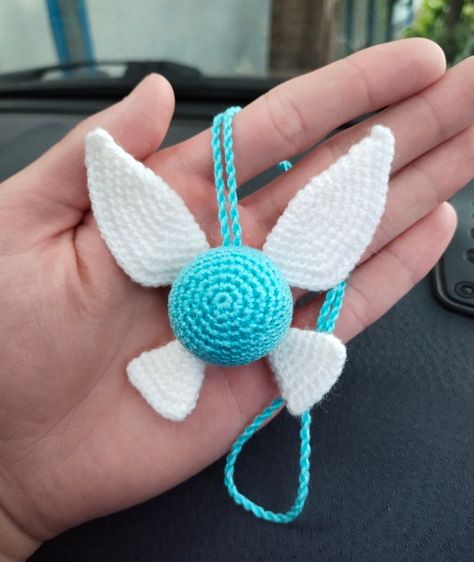 Zelda fairy Navi crochet car charm. Size 3.8 inches Complement your beautiful everyday life with cute car accessories. *Please note Real colors may differ slightly depending on the settings of your display. Cleaning: hand wash in cold water, lay flat do dry. SHIPPING: I will let you know when your package is on the way. I will also send you a tracking number of your package. Crocheted toy is ready to ship now! Thank you for visiting! Crochet Fairy Accessories, Car Mirror Crochet, Legend Of Zelda Crafts, Zelda Fairies, Legend Of Zelda Crochet, Crochet Zelda, Genshin Crochet, Navi Zelda, Zelda Crochet