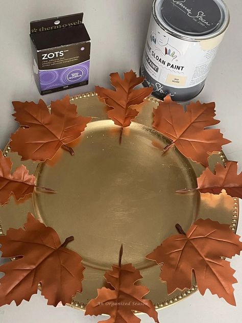 Want to set a table that will wow your guests? A table that looks fabulous but doesn't break the bank! Then, you'll want to make my super easy DIY plate chargers that are perfect for Fall! I'll show you how to use Dollar Tree faux leather leaves to make a beautiful plate charger to upgrade your Autumn tablesettings! Please save this in and follow us for more DIY, seasonal decor, and home organization inspiration! Charger Plate Wreath Diy, Plate Chargers Ideas Diy, Thanksgiving Charger Plates, Painting Charger Plates, Charger Plate Crafts Diy, Charger Decorations Diy, Diy Chargers Plates Ideas, Diy Plate Chargers, Dollar Tree Charger Plates Diy