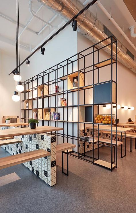 Lebkov and Sons Café opens in Amsterdam | Wallpaper* Partition Design For Cafe, Cafe Partition Design, Restaurant Shelving, Industrial Style Decor, Storage Shelving, Lan Can, Coffee Shop Design, Cafe Interior Design, Restaurant Interior