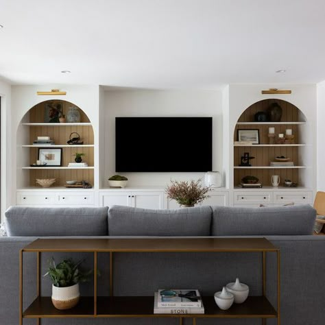 Bright and airy living room design Living Room Tv Not Focal Point, Media Room Cabinet Ideas, Built In Media Wall Basement, Amber Interiors Tv Room, Media Console Built In, Media Wall Built In Ideas, Recessed Tv Cabinet, Large Tv Built In, Built In Shelves Tv Wall