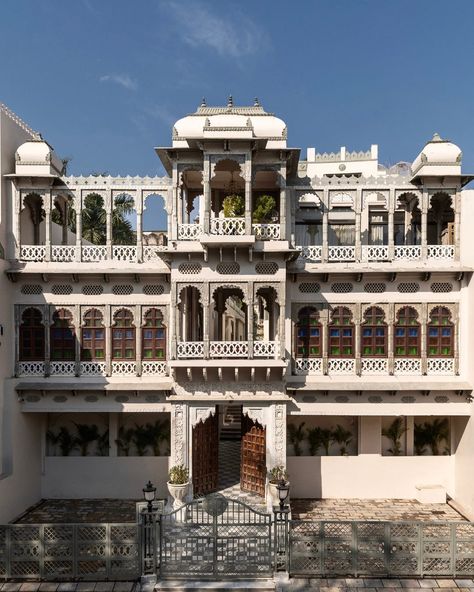 FIRST IN: Nestled against the eastern wall of the Udaipur City Palace, Manuscript Jhilwara Haveli is an aesthete's delight. Built as the Udaipur residence of the royal house of Jhilwara, the boutique property is a 30-key hotel housed in a haveli that dates to 1910. Over the past century, the haveli underwent many iterations, from being a private residence to a school to a plant nursery, and even a poultry farm. In its current avatar as a boutique hotel, the heritage building retains most of... Haveli House India, Palace Indian, Udaipur City Palace, Architecture Sheets, White Palace, Mansions Interior, Heritage Building, House Architecture Styles, Hotel House