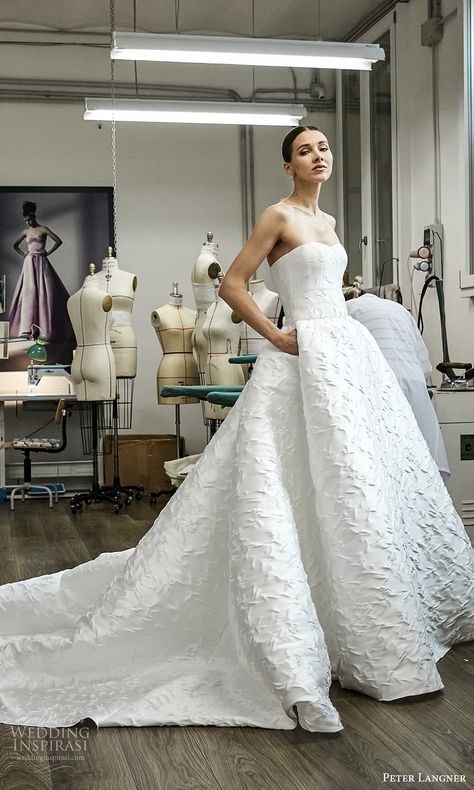 peter langner spring 2025 bridal strapless straight across neckline textured a line ball gown wedding dress chapel train (1) mv -- Peter Langner Spring 2025 Wedding Dresses | Wedding Inspirasi  #wedding #weddings #bridal #weddingdress #weddingdresses #bride #fashion #label:PeterLangner #season:Spring/Summer #week:192024 #year:2025 ~ Wedding Dress With Texture, Wedding Dress Trends 2025, Wedding Dresses 2025 Bride, Wedding Dress 2025, 2025 Wedding Dresses, Most Expensive Wedding Dress, Style In Winter, Wedding Gown Trends, A Line Ball Gown