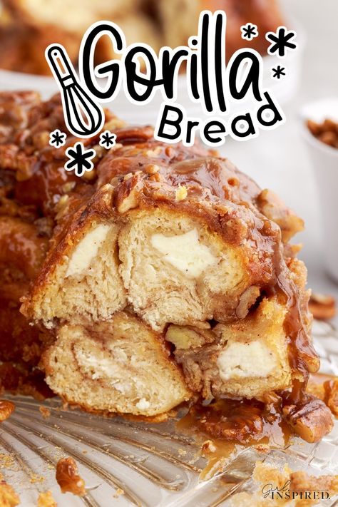 This is the best gorilla bread you have ever tasted. Filled with sweetness from the sugar, cinnamon, and cream cheese. This pull apart bread is fantastic for holidays, brunches, and dessert. Cream Cheese Filled Monkey Bread, Cream Cheese Monkey Bread Recipe, Gorilla Bread Cream Cheese, Pull Apart Breakfast Bread, Breakfast Pull Apart Bread, Cream Cheese Monkey Bread, Gorilla Bread, Cinnamon Sugar Pull Apart Bread, Pecan Monkey Bread