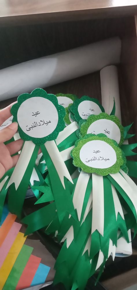 Handmade badges for Eid Milad Un Nabi SAW Milad Un Nabi Decorations In School, Rabiul Awal Decoration Ideas, Milad E Nabi, Rabi Ul Awal Decoration Ideas, Milad Decoration Ideas For School, Eid Meeladun Nabi Mubarak, Milad Un Nabi Aesthetic, Paper Badges Ideas, Eid Milad Un Nabi Decoration Ideas