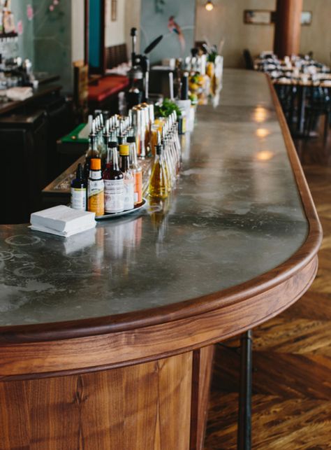 A simple, small space packed with surprising detail. See Skylar Morgan Furniture's work in oiled walnut on the bar and tambour entryway as well as banquettes, back bar shelving and bright, welcoming front doors. Back Bar Shelving, Hangout Space, Wine Bistro, Bar Tile, Home Bar Ideas, Green Tile Bathroom, Bar Inspiration, San Carlo, Cabinetry Design