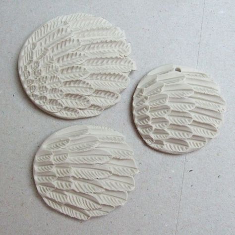 https://flic.kr/p/9vVagB | feathers | playing with feather designs and textures, I'll probably leave one white, glaze one and use underglaze colours on another....maybe... Feather Texture, Ceramic Texture, Surface Decoration, Ceramic Techniques, Polymer Crafts, Feather Design, White Glaze, Ceramic Pottery, Feathers