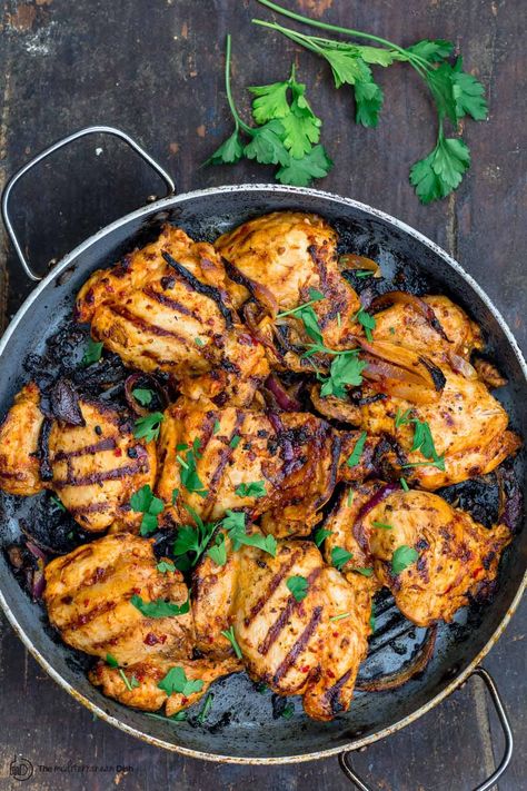 A must-try Harissa Chicken Recipe with garlic, onions, and a quick homemade harissa paste. Video and tips included. Homemade Harissa, Chicken Thighs In Oven, Ripped Recipes, Harissa Recipes, Harissa Chicken, Vegan Stew, Harissa Paste, Clam Recipes, Garlic Recipes