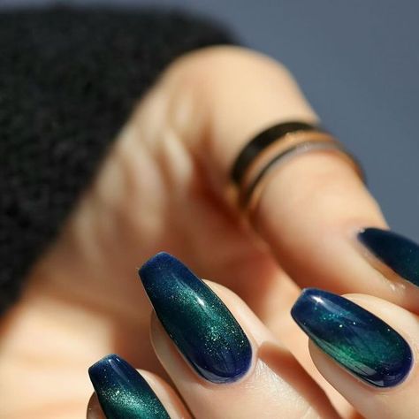 Elissa✨Nail Inspo•DIY Nails•Nail Care on Instagram: "Drown My Demons 🌊🌊🌊✨ Mooncat made this gorgeous deep ocean blue with a green magnetic shimmer and it’s such a vibe (and so satisfying to put on!) Shown in two coats over my natural nails - sun and shade - and the last slide shows this beauty unmagnetized on my thumb. *this collection was sent to me as pr with no obligation to post* #mooncat #drownmydemons #mooncatdrownmydemons #magneticnails #magneticnailpolish #nailinspo #nailpolishinspo #bluenails #nailphotography #nailphoto #nailsoftheday #nailpolishswatch #manicure #naturallight #naturallightphotography #moodynails #darknails #shimmernails" Dark Blue Green Nails, Green Blue Nails, Blue And Green Nails, Nails Sun, Natrual Nails, Ocean Nails, Dark Blue Nails, My Demons, Green Nail Art