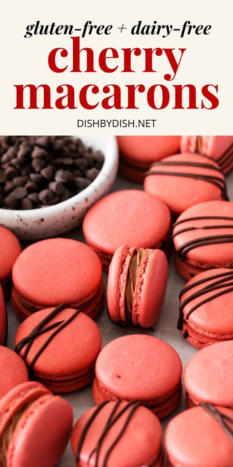 Up close shot of cherry macarons on parchment paper. Chocolate Covered Cherry Macarons, Gluten Free Macaroons Recipe, Chocolate Cherry Macarons, Sugar Free Macarons, Dairy Free Macarons, Sakura Macaron, Valentines Macarons, Gluten Free Macarons, Sweet Cherry Jam