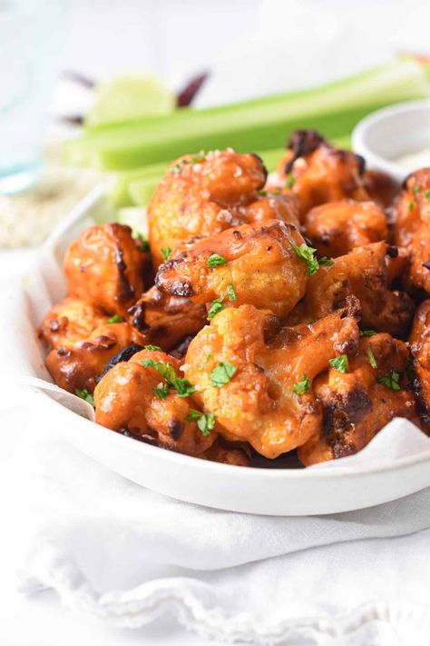 These Air Fryer Buffalo Cauliflower bites are super easy to make and such an healthy meat-free party food ! Bonus, these are also dairy-free, vegan and gluten-free friendly so everyone can have a bite! Easy Vegan Appetizers, Air Fryer Buffalo Cauliflower, Conscious Plant Kitchen, Buffalo Cauliflower Recipes, Buffalo Cauliflower Bites, Healthy Meats, Plant Kitchen, Low Carb Flour, Quick And Easy Appetizers