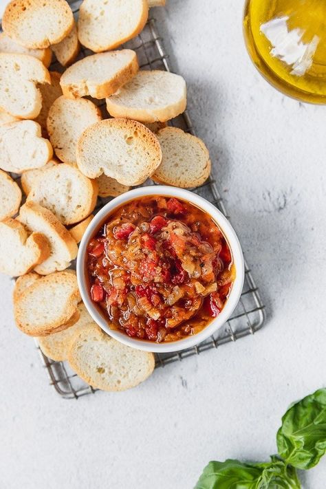 This melt-in-your-mouth jammy-like tomato-onion-red pepper spread is absolutely worthy of a 1-hour simmer. It's a delicious appetizer all on its own, spread on a cracker or crostini, or as an addition to a cheeseboard. Endless possibilities! | Fork in the Kitchen #appetizer #recipe #forkinthekitchen Crostini Toppings, Green Olive Tapenade, Crostini Appetizers, Gourmet Appetizers, Homemade Buffalo Sauce, Crowd Pleasing Appetizers, Vegetarian Appetizers, Sour Cream And Onion, Spring Recipes