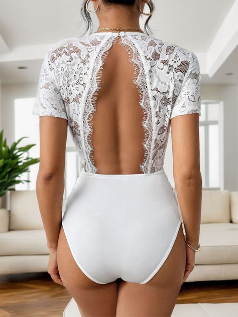 Cutout V-Neck Short Sleeve Lace Bodysuit 🌟 Turn heads in our exquisite Cutout V-Neck Lace Bodysuit! 🌺 Luxuriously soft, 95% polyester, 5% elastane with moderate stretch to hug your curves perfectly. Semi-sheer lace adds a dash of mystery! 😍 Sizes S-XL. Care is a breeze: machine wash cold, tumble low. 🇺🇸 FREE shipping across the US! Snag yours and flaunt your style! 💃 #FashionTrend #LaceLove #FreeShipping https://belongandbe.com/products/cutout-v-neck-short-sleeve-lace-bodysuit Instagram Cutout, Swimsuit Collection, Crop Top Bra, Maxi Dress Cocktail, Swimwear Cover Ups, Maxi Dresses Casual, Swimwear Cover, Lace Bodysuit, Skirted Swimwear